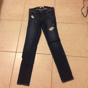 Dark wash, distressed jeans