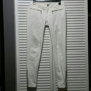 Michael Kors White Skinnies with gold zippers
