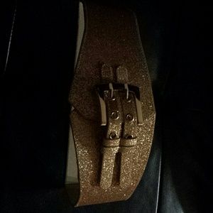 NWOT BEBE belt gold color elastic on the back