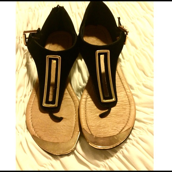 gold and black sandals