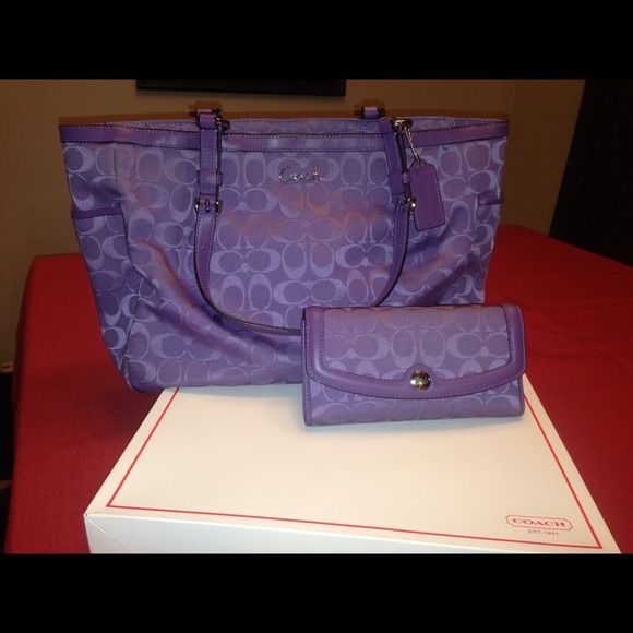 Purple large Coach purse w/ wallet and checkbook.