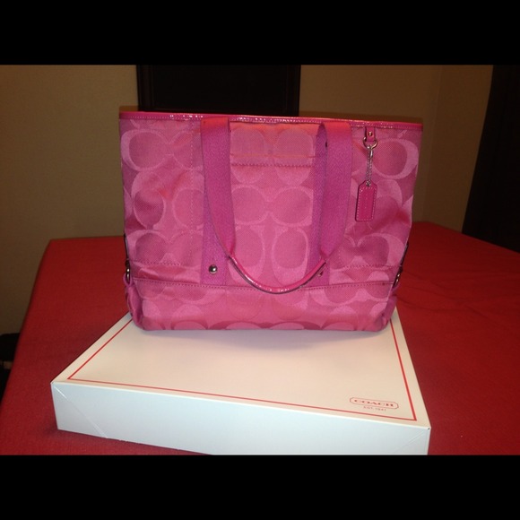 Medium bright pink Coach purse