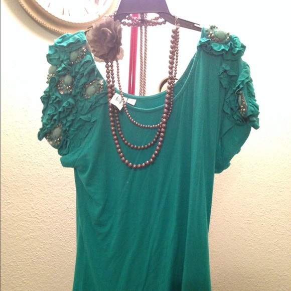 Teal shirt with accents on shoulders!