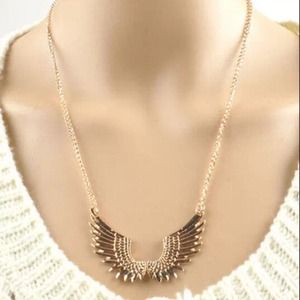 Gold tone wings