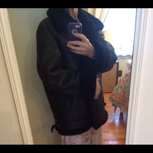 Shearling coat, black outside and lining.