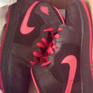 Black and red air jordans
