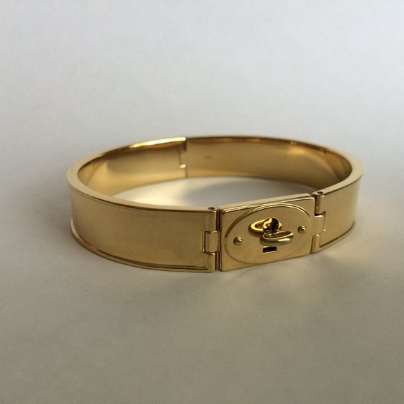 Gold Fossil turn lock bracelet