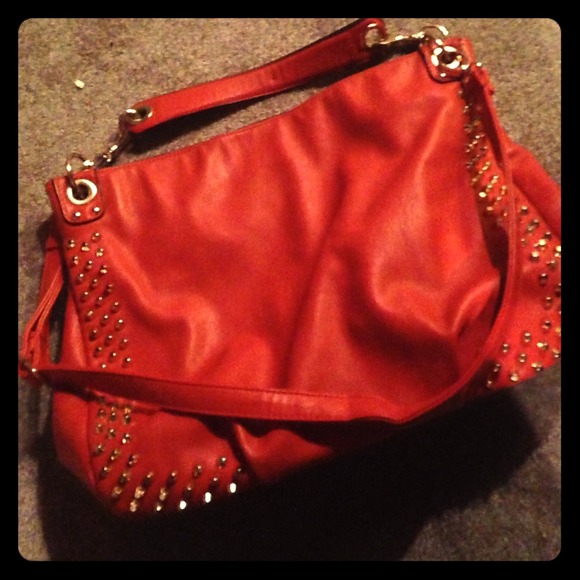 Hobo burnt orange leather bag with gold studs