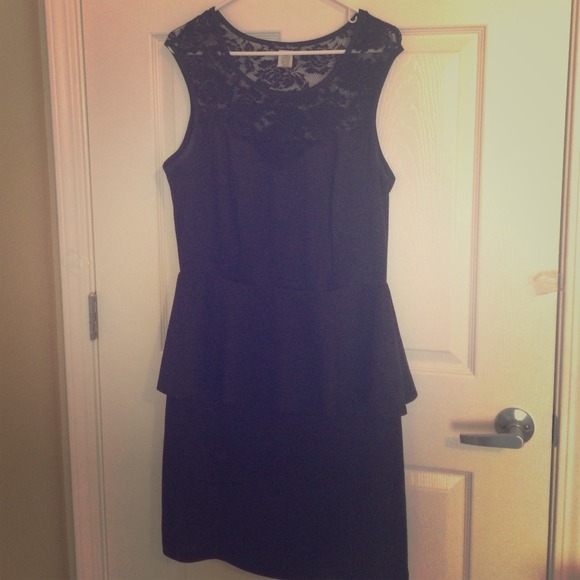 Black peplum dress with lace detailing