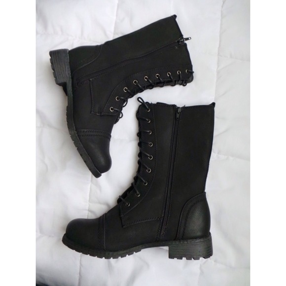 Black combat boots.(:
