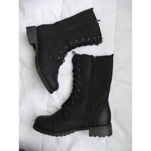 Black combat boots.(: