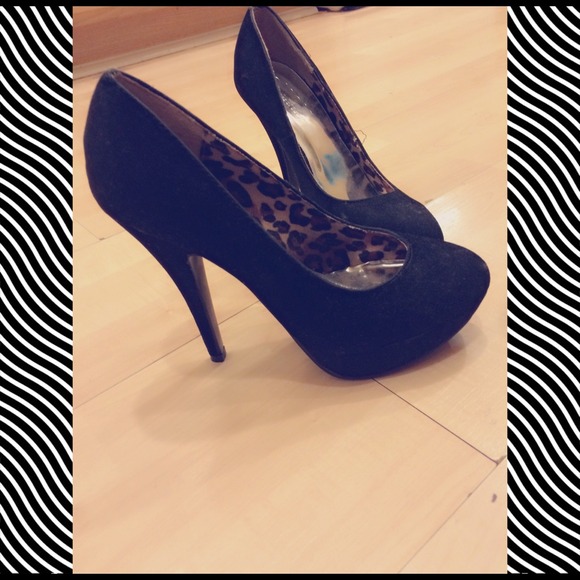 Black suede pumps