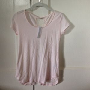 La made light pink t shirt.Size xs. High/low hem.