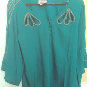 Romeo and Juliet Couture turquoise beaded shirt.