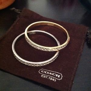 Coach bangles- 1- Gold 1- silver