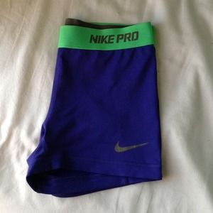 RESERVED Blue and Green Nike Pros 💙💚