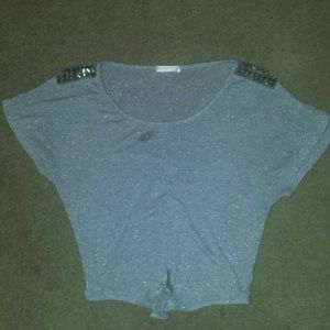 Grey shirt with silver studs, ties at the bottom