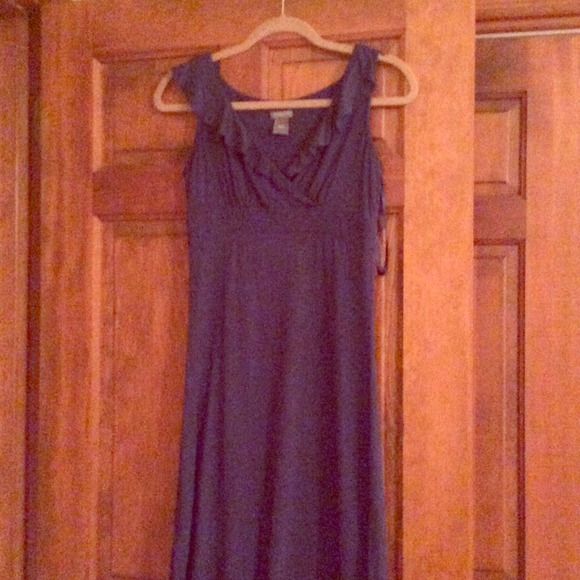 Navy sleeveless dress with ruffled v-neckline
