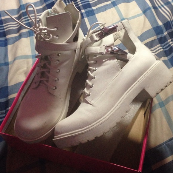 White ankle boots with buckle