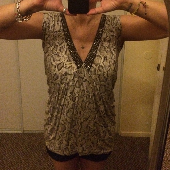 Snakeskin print shirt with Rhinestone neckline