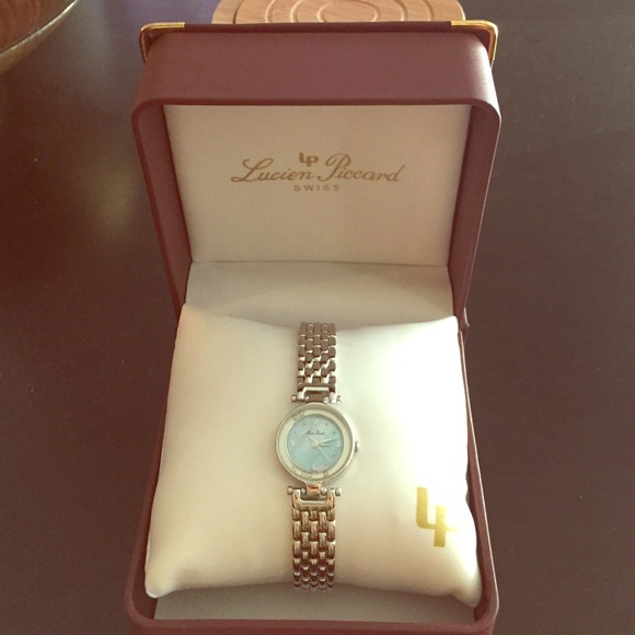Lucien piccard watch with floating diamonds
