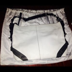 White leather Coach Carly with gray accents.