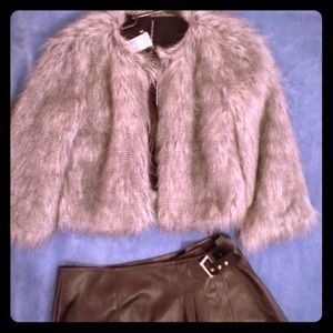 Faux feathery jacket new with Tags price reduced!!