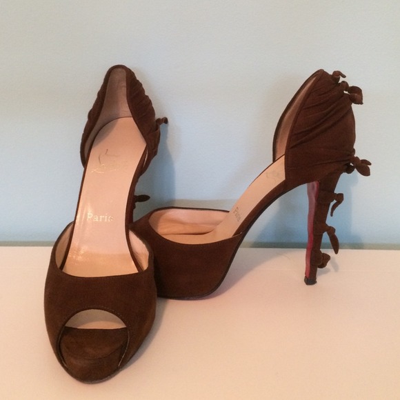 Christian Louboutin brown suede peep toe pump.