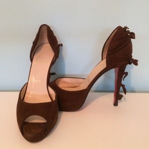 Christian Louboutin brown suede peep toe pump.