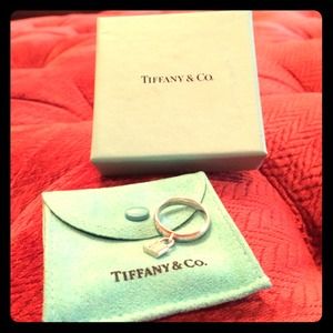 Tiffany & Co. Silver band lock charm ring size 7