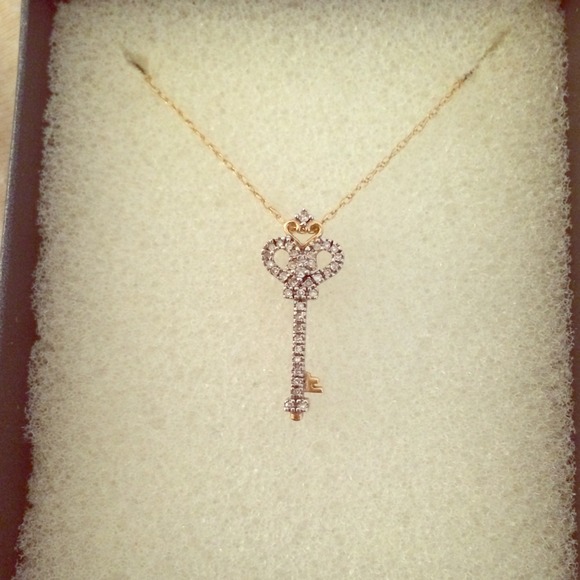Diamond and gold skeleton key necklace