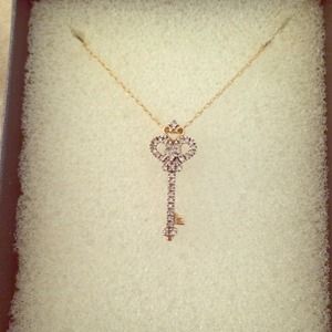 Diamond and gold skeleton key necklace