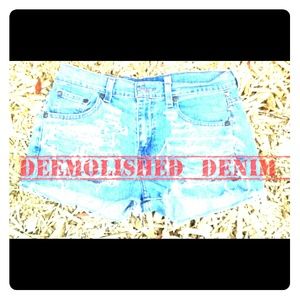DISTRESSED DENIM SHORTS