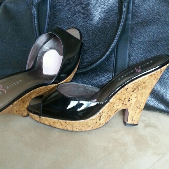 Gently worn. Black wedge sandal. Patent leather.