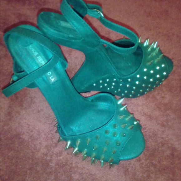Used heeless black shoes with brass spikes/studs