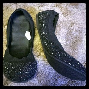 Black sparkly flats.