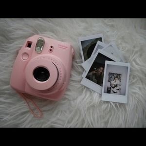 Pink polaroid camera