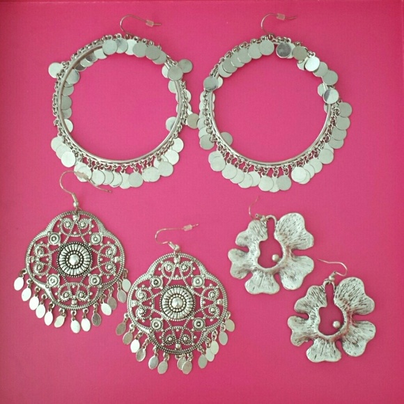 Bundle of silver tone earrings