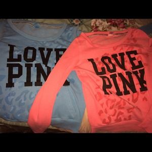 Baby blue and pink PINK sweaters.