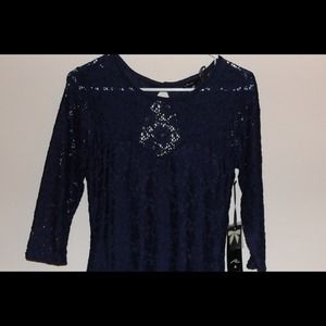 Navy blue, fitted lace dress with open back