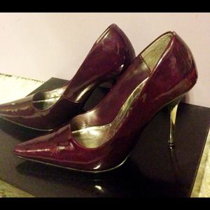 Deep purple pumps with silver heels