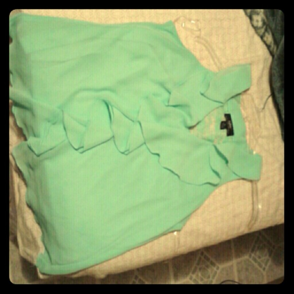 A beautiful green shirt love the fabric