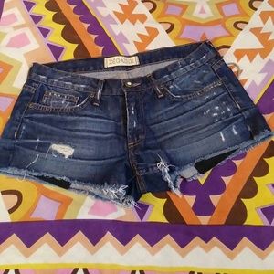 Stylish Distressed denim shorts.
