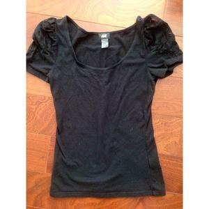 Cute black top with lace detailed sleeves