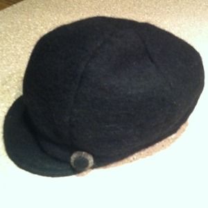 Black wool/polyester cap with button :)