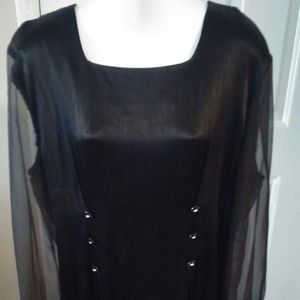 Long sleeve cocktail dress.