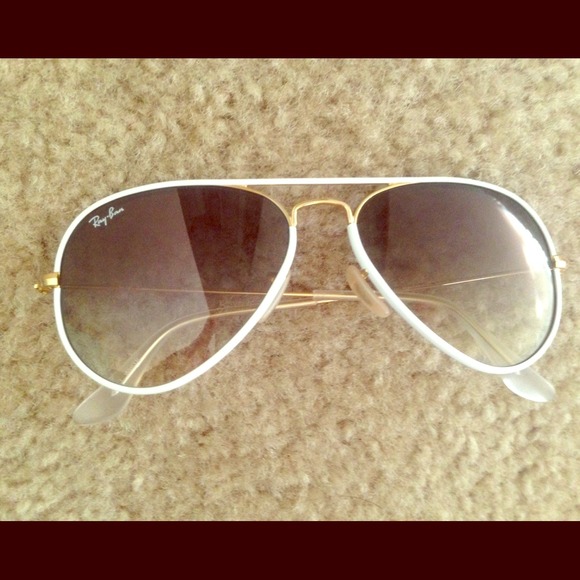 White Aviator Ray-Ban sunglasses.