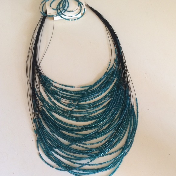 Teal beaded necklace and earrings!