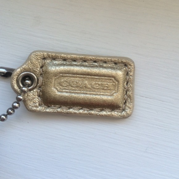 Additional pics of gold coach wristlet