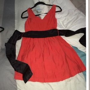 Cocktail dress. Pink with long black bow